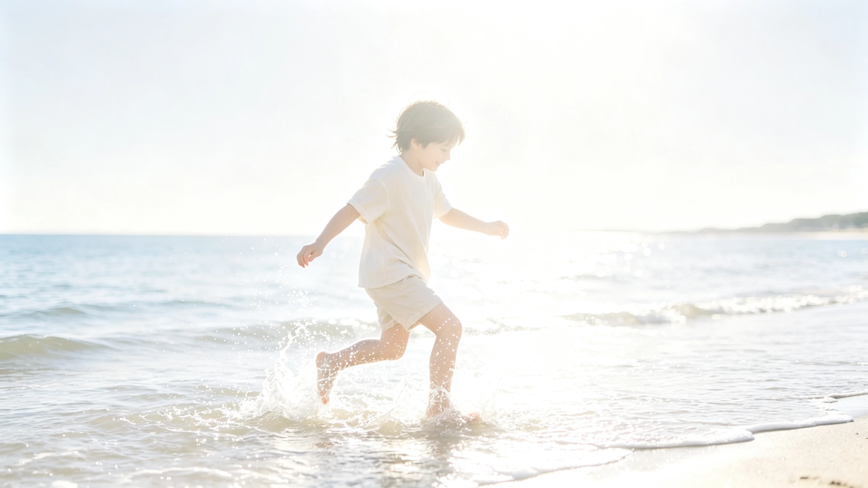 Overexposed child at the beach before correction