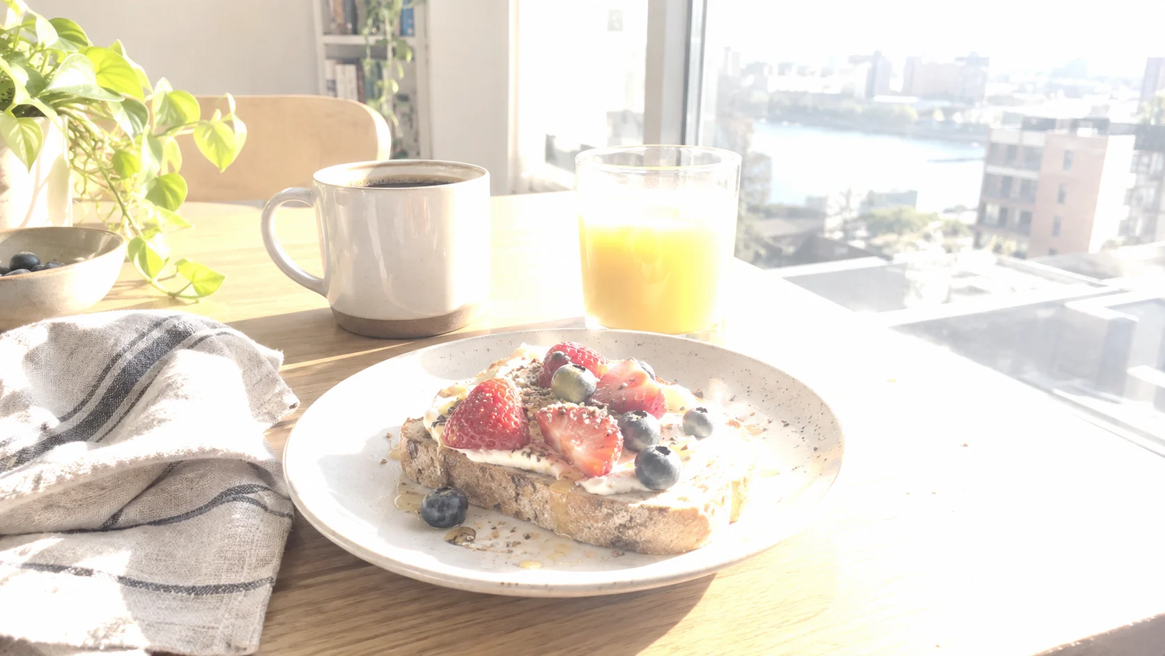 Overexposed brunch table beside a window before correction
